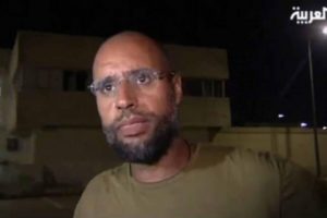 Kaddafi'nin yargılanması ertelendi