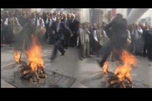 Bakan Eroğlu, Nevruz ateşinden atladı