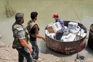 Asi Nehri'nden sınır &ouml;tesine ila&ccedil; yardımı