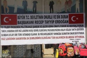 Faiz lobisine karşı afiş astı...