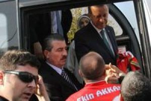 Erdoğan ve eşine poşu taktılar