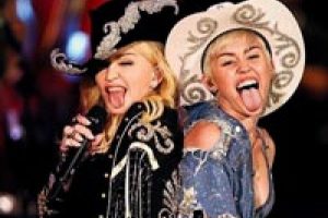 Madonna'nın kanatları Miley'yi sardı...