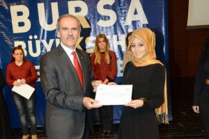 BUSMEK bin 70 kişiye altın bilezik taktı