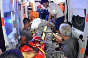 Topladığı kağıtları bırakmak istemedi