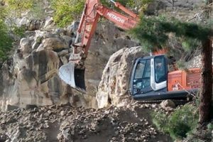 Kaya mezarlarına iş makinası ile daldılar!