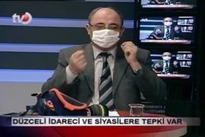 Gaz maskesiyle haberleri sundu!