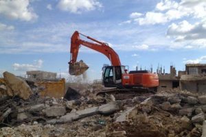 DBP'li belediyelerin iş makinleri Kobani'de savaşın izlerini siliyor