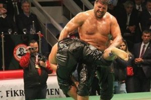 Başpehlivanlar şehitler i&ccedil;in kol bağladı