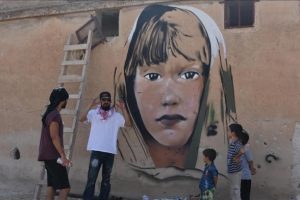 T&uuml;rk grafiti sanat&ccedil;ılarından Suriye'de anlamlı &ccedil;izimler