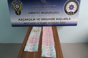 Sahte parayla alışveriş yapan zanlılar yakalandı