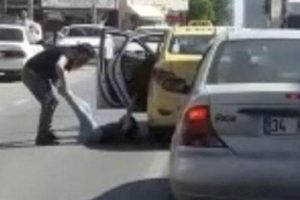 Genç kadını araçtan aşağı atan taksici tutuklandı!