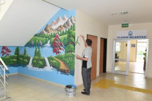 Bursa'da g&uuml;nd&uuml;z muhtar, gece ressam