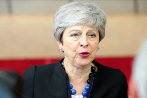 May'den Putin'le g&ouml;r&uuml;şme &ouml;ncesi sert mesaj
