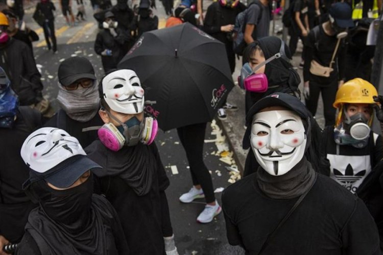 Hong Kong'da protestolara yol a&ccedil;an yasa tasarısı geri &ccedil;ekildi