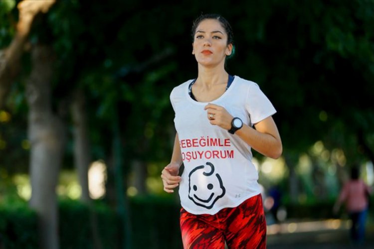 'Karnı burnunda' maratona hazırlanıyor