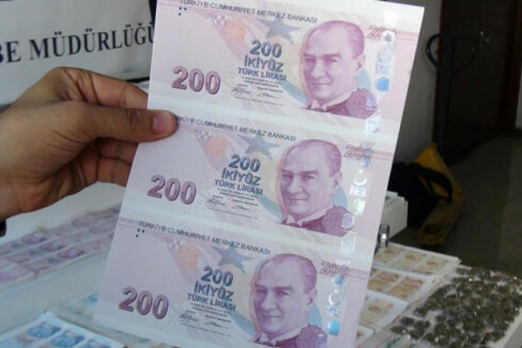 Sahte para ile alışveriş yapmak isterken yakalandı