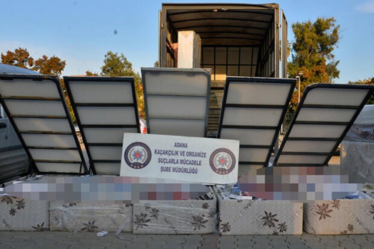 Kamyonetteki yataklara sigara gizlemişler!