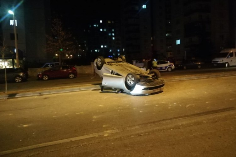 Takla atan otomobilden hafif yaralı kurtuldu