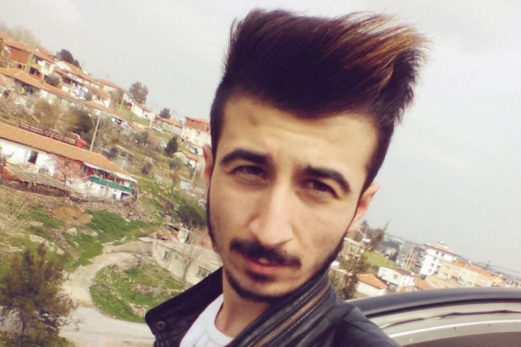 Alev alan tinerin kıyafetine sı&ccedil;ramasıyla tutuşan iş&ccedil;i ağır yaralandı