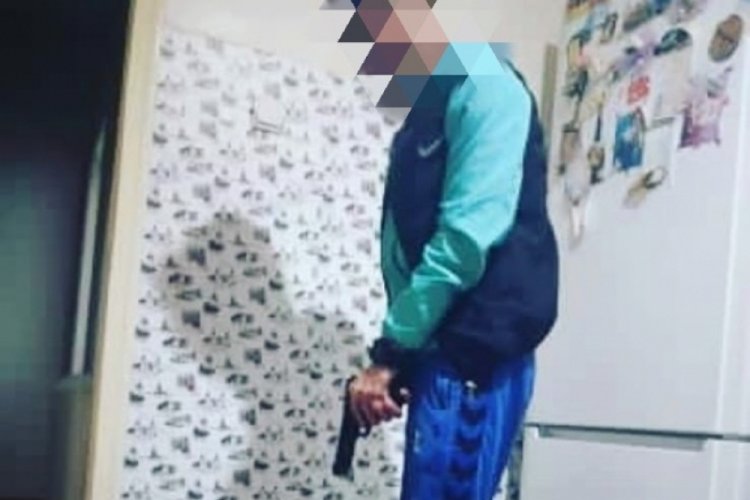 Sosyal medyada silahla poz verdi, yakalandı