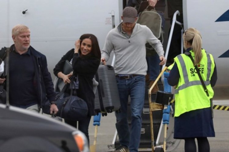 Prens Harry ve Meghan Markle valizlerini kendi taşıdı