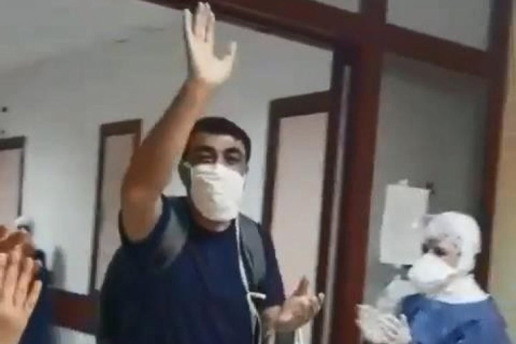 Korona vir&uuml;s&uuml; yenen hasta alkışlarla taburcu edildi