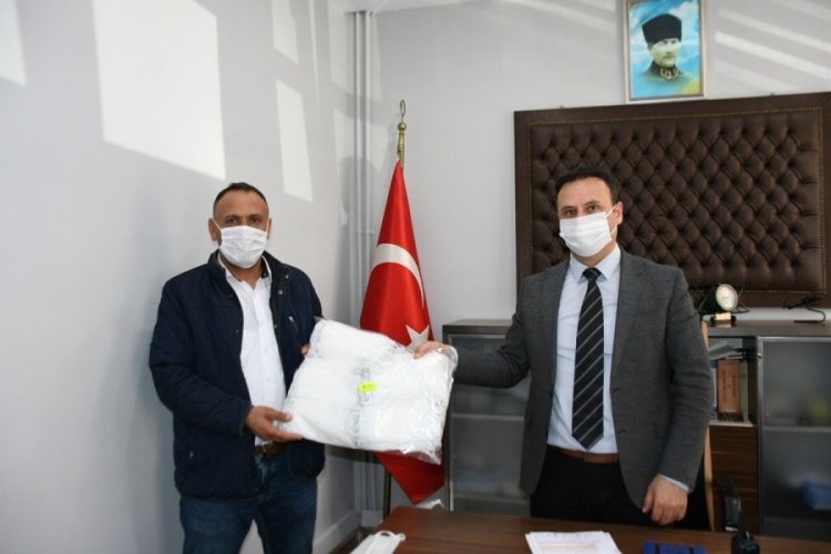 Bursa İneg&ouml;l halk otob&uuml;slerinde maske dağıtımı başladı
