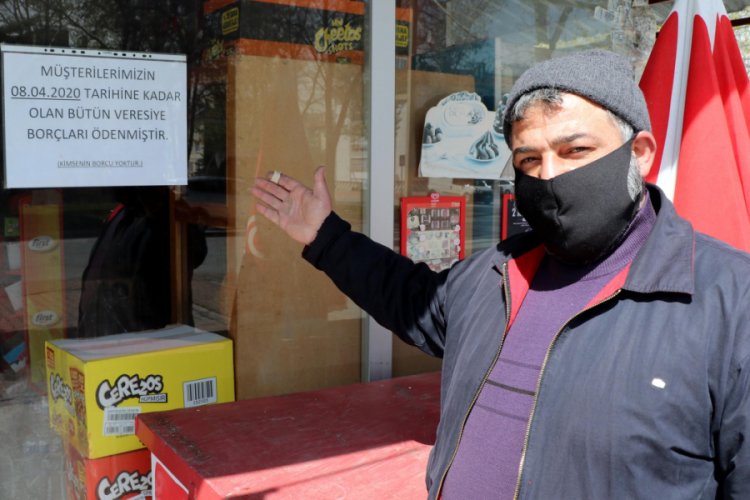 Hayırsever, mahallenin t&uuml;m bakkal borcunu &ouml;dedi