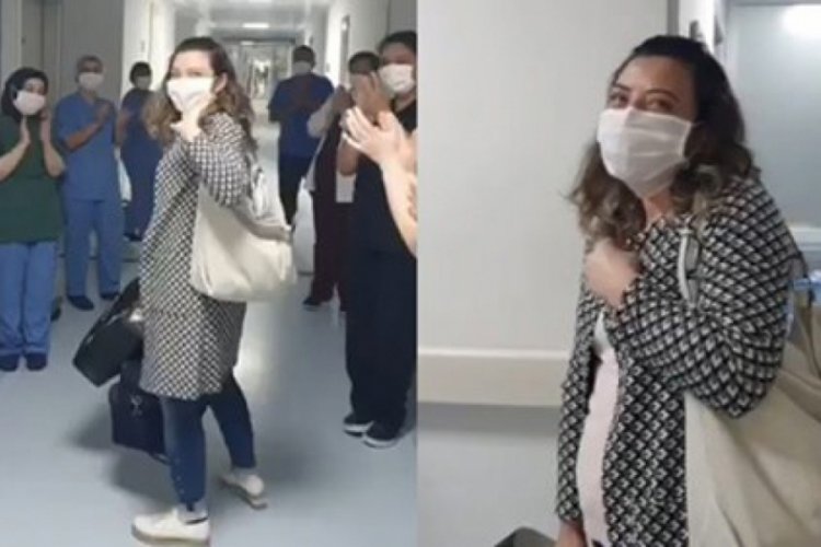 Koronavir&uuml;s&uuml; yenen hemşire, mesai arkadaşlarının alkışlarıyla taburcu oldu