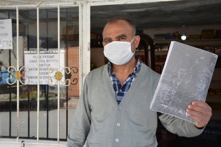 İş insanı, veresiye defterindeki 3 bin 183 lira borcu &ouml;dedi