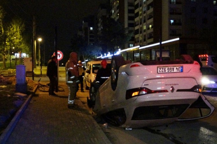Bursa'da 3 takla atan otomobilden yara almadan kurtuldu