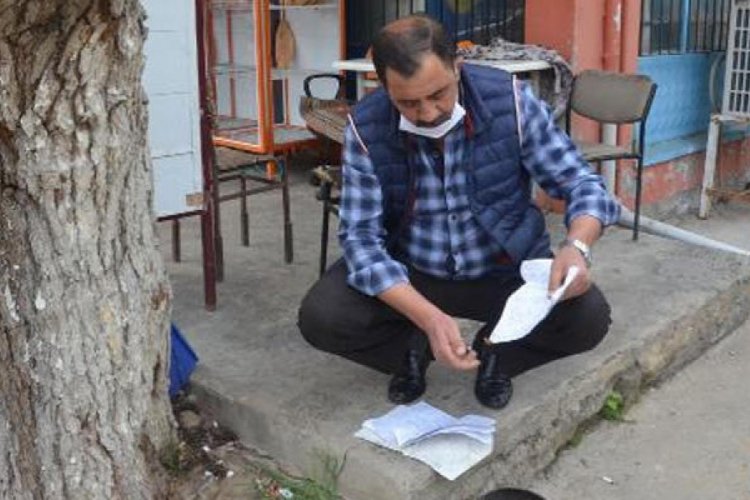 18 ailenin veresiyesini kapattı, ardından defteri yaktırdı