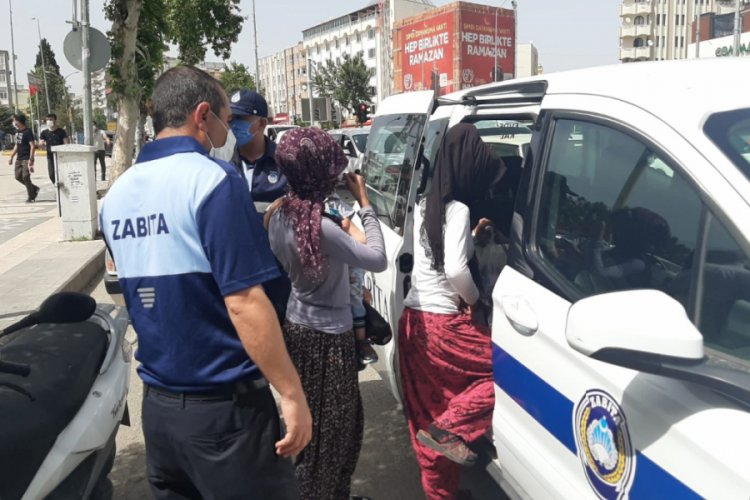 Dilenciler ile tartıcı arasında yer kavgası