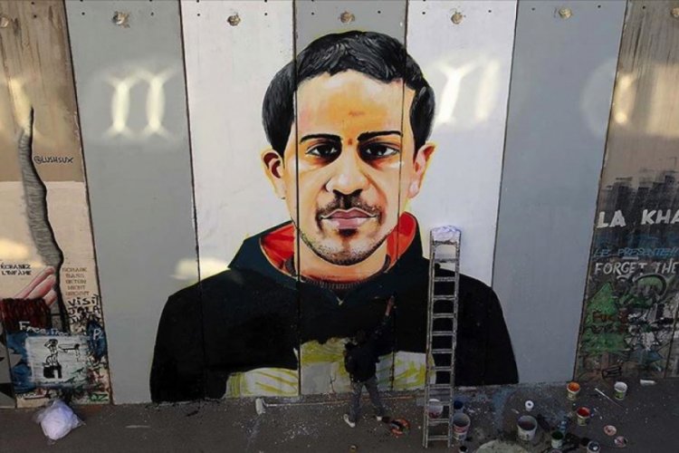 Filistinli ressam Utan&ccedil; Duvarı'na Floyd'dan sonra şehit İyad Hallak'ı da resmetti