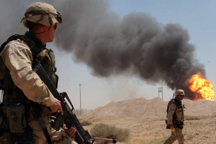 Irak'ta ABD ordusuna ait ara&ccedil;lar ateşe verildi