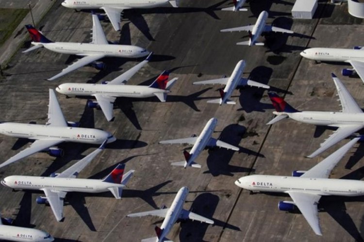 Delta, bin 900'den fazla pilotunu izne &ccedil;ıkarıyor