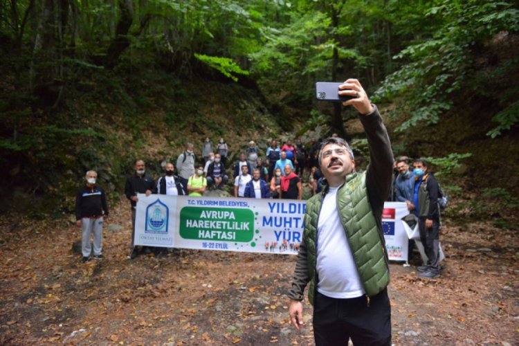 Bursa Yıldırım Belediye Başkanı Yılmaz muhtarlarla y&uuml;r&uuml;d&uuml;