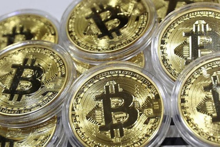 Bitcoin 18,000 doların üzerinde tutunuyor