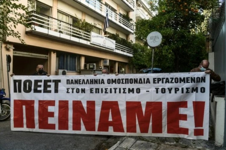 Yunanistan'da sendikalardan Mi&ccedil;otakis'e "a&ccedil;ız" pankartlı tepki