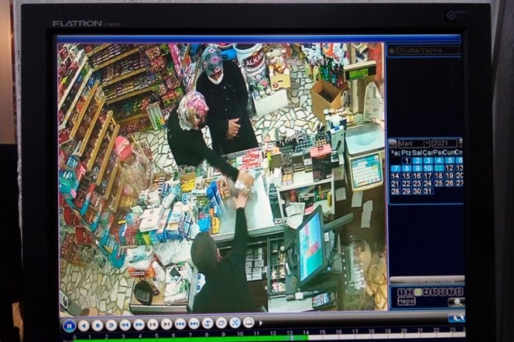 Bursa'da m&uuml;şteri kılığında girdikleri markette 'tırnak&ccedil;ılık' yaparken yakalandılar