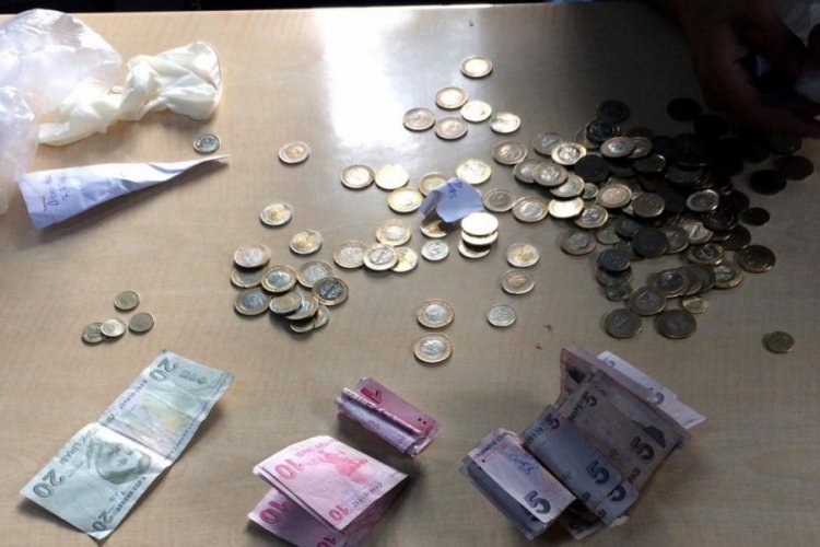Dilencinin sakladığı paralar bebek bezinde &ccedil;ıktı