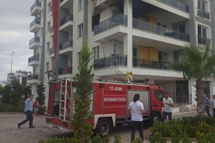 Yangında mahsur kalınca pencereden atladı