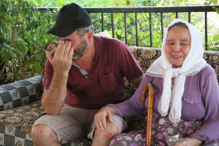 Annesini 600 metre sırtında taşıyıp yanmaktan kurtardı!
