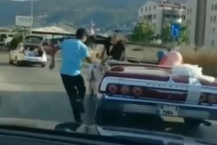 Bursa'da otomobilin peşini bırakmayan çocuk, damadı çıldırttı