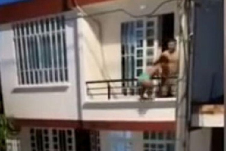 Kolombiya'da sevgilisi tarafından basılınca diğer kadını balkondan aşağı sarkıttı