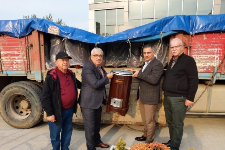Uludağ Organize Sanayi B&ouml;lgesi, selzedelere soba yardımında bulundu