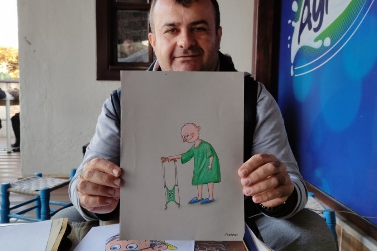 Bursa'da kanser hastaları i&ccedil;in karikat&uuml;rler &ccedil;iziyor