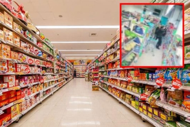 Markette maskesiz gezdiği i&ccedil;in uyarıldı, &ccedil;alışana silah &ccedil;ekti