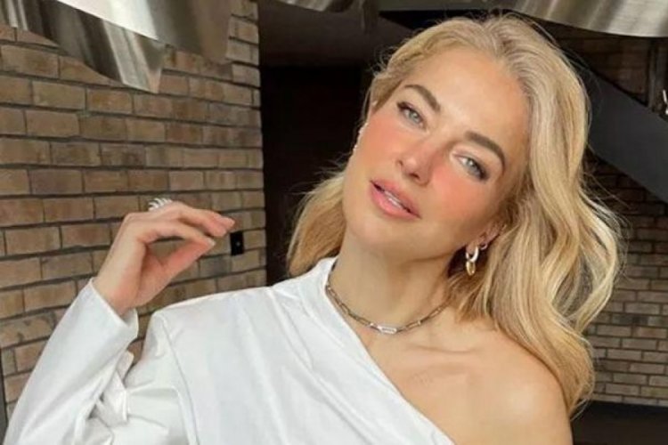 Burcu Esmersoy'un boynundaki kolyenin sırrı &ccedil;&ouml;z&uuml;ld&uuml;!