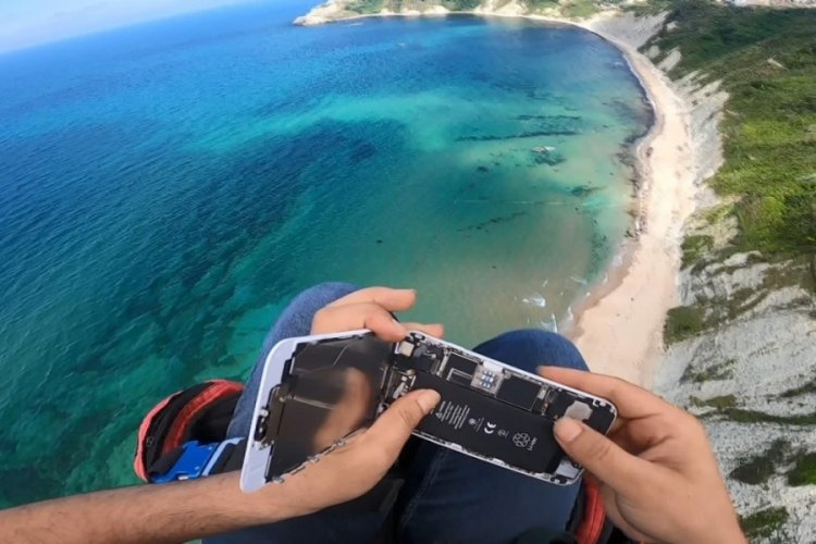 Paramotor u&ccedil;uşunda telefon tamiri